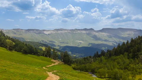 Green mountain valley time lapse scene Stock Footage 263318755