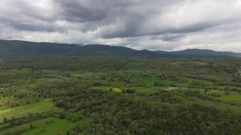 Green Mountain Valley Under Dramatic Clouds in Peloponnese Stock Footage 337088780