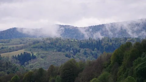 Green mountains and cloudy sky Stock Footage 145360613
