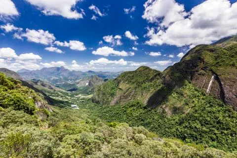 Green mountains with blue sky with clouds Stock Photos