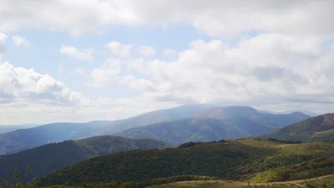 Green mountains. Cloudy sky and hills meadow. Panning. Beautiful Panoramic View Stock Footage 117170119