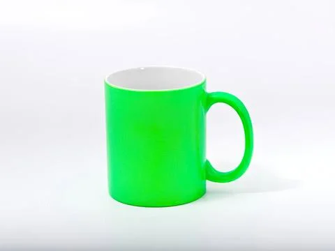 Green mug on a white background for coffee or tea Stock Photos