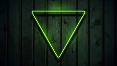 Green neon luminous triangular frame on dark wooden abstract background Stock Footage 274061894