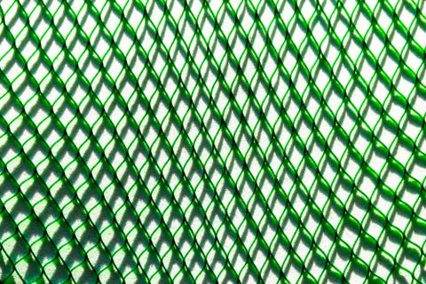 Green Net Casting the Shadow on the White Background Foto stock