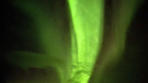 Green northern lights dancing in the starry Iceland sky Stock Footage 330283054