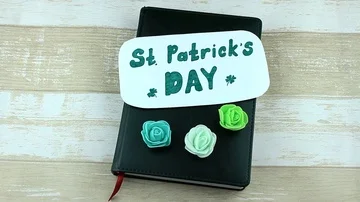 Green notebook and St. Patrick's Day Stock Footage 85595614