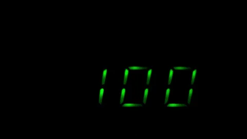 Green numbers change on electronic clock Stock Footage 82358294