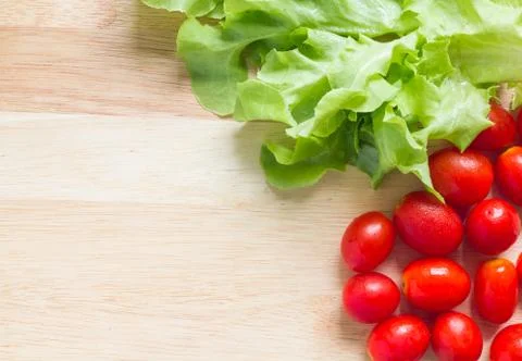 Green Oak Leaf and Cherry Tomatoes Foto stock
