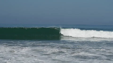 Green ocean wave breaking into white foam Stock Footage 340641697