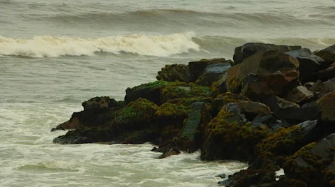 Green Ocean Waves Crash Against Rocks, Slow Motion Stock Footage 48255523