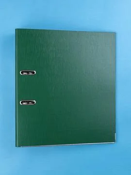 Green  office folder on blue background. Office Folder Template Stock Photos