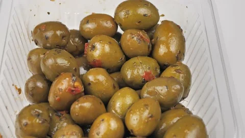 Green olives close-up. Cold appetizer. Healthy meal, vegetarian food. Pickled Stock Footage 219418123