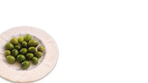 Green olives serving on patterned plate as healthy appetizer 写真素材