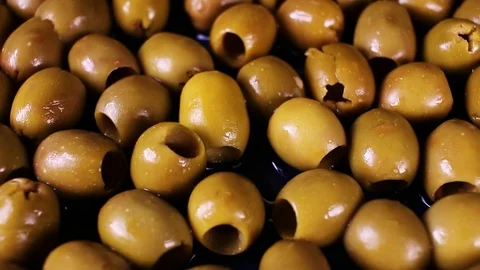 Green olives texture video rotating food closeup background Stock Footage 92704770