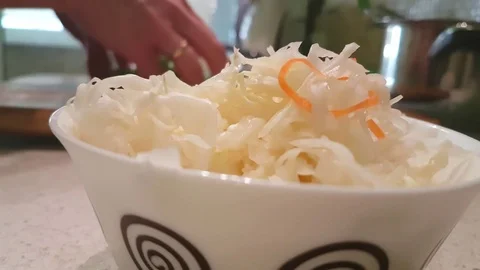 Green onion pouring into salad Stock Footage 80880001