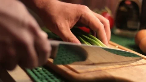 Green onion on the wooden table. Stock Footage 80991207