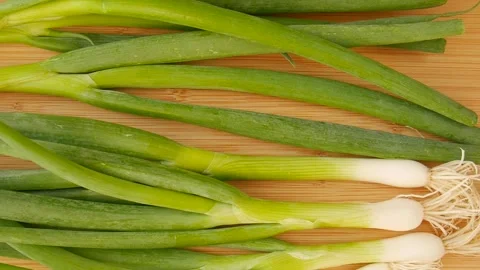 Green onions on the table. Stock Footage 328441188
