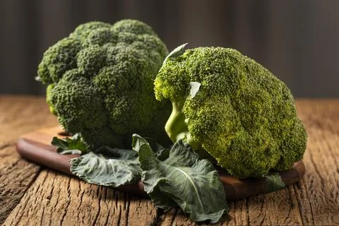 Green organic broccoli on the table. Stock Photos