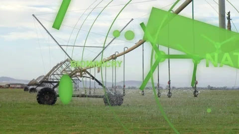Green overlay appearing, pivot pipeline spraying water while text scaling, Stock Footage 334418892