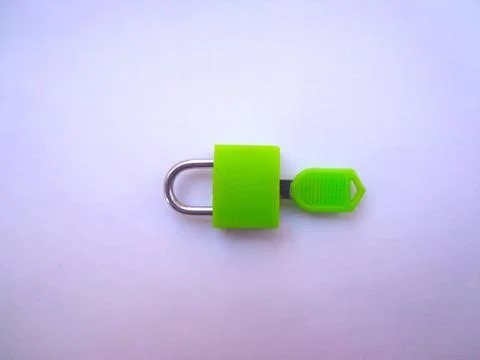 Green padlock in locked Fotos Stock