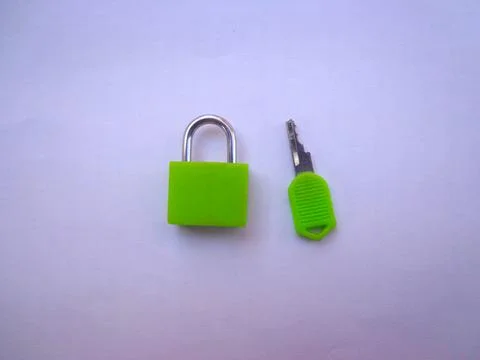 Green padlock in locked Stock Photos