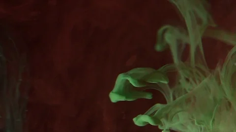 Green paint on the dark background Stock Footage 85843486