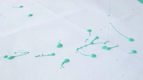 Green paint drips onto the floor. Stock Footage 252735898