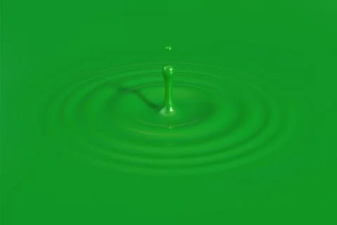 Green paint drop falling on surface background Ilustração Stock