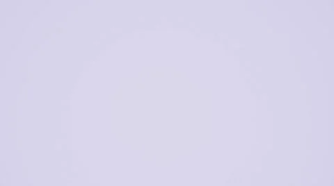 Green paint drop falls on white surface Stock Footage 58761420