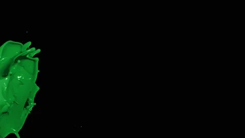 Green paint splash thrown in slow motion, liquid isolated on black (4K) Stock Footage 137112196