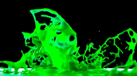 Green paint splashing, isolated on black backgorund Stock Footage 38908205