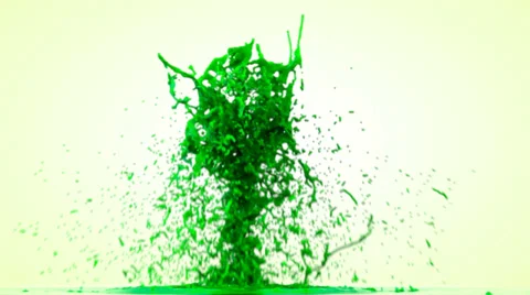 Green paint splashing, isolated on bright backgorund Stock Footage 39073602
