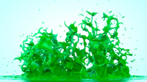 Green paint splashing, isolated on bright backgorund Stock Footage 39081280