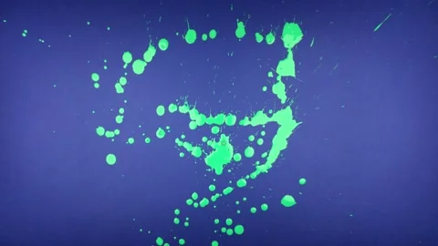 Green paint splatter on blue screen. #2 動画素材 221426934