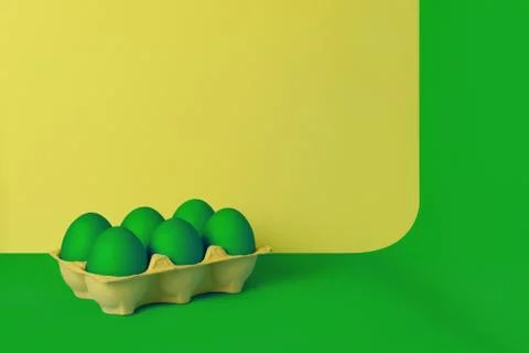 Green painted Easter eggs in yellow wrapping on green and yellow background . Stock-Fotos