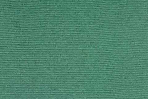 Green paper background with pattern. Stock Photos