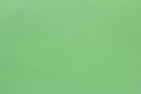 Green paper background.The texture of thick green paper for creativity.Space  Stock Photos