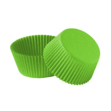Green paper baking forms for muffins and cupcakes Stock Photos