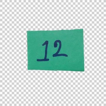 Green paper label with handwritten number twelve isolated on a transparent .. Фото