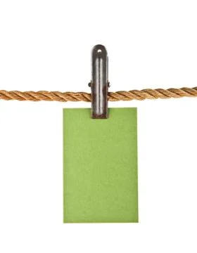 Green paper on a rope 스톡 사진