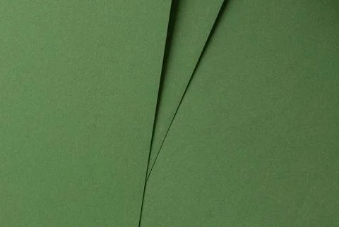 Green paper texture with folded geometric lines. Minimal abstract backgroun.. 스톡 사진