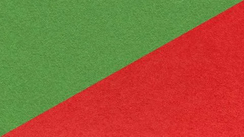 Green paper texture two color background with red diagonal split and copy s.. Stock Illustration
