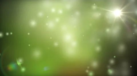 Green particles randomly fly on a green background Stock Footage 60207146