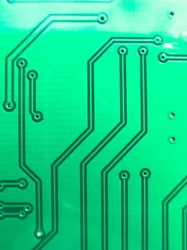 Green PCB board made of PCB with a pattern of contact tracks. Technological.. Stock Photos
