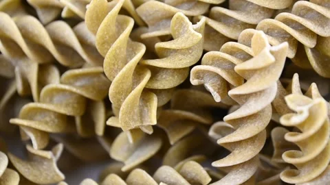 Green pea pasta shifting in close up kitchen still life Stock Footage 331590532