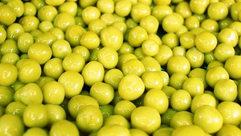 Green pea peas rotating texture pattern closeup footage Stock Footage 97234407