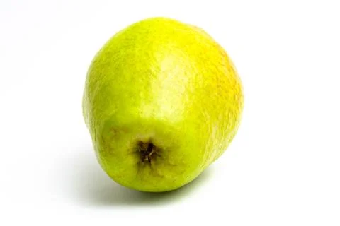 Green pear on a white background. close up Stock Photos