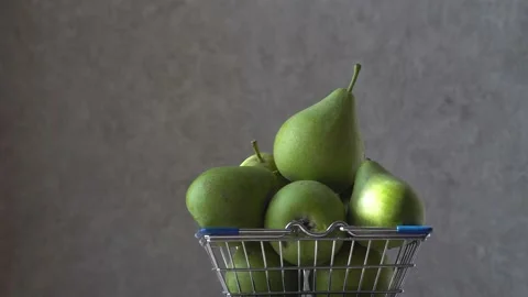 Green pears in a basket 4K Stock Footage 162321965