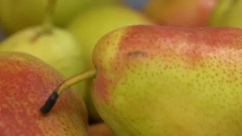 Green pears on the market close-up. The camera is moving. Stock Footage 140922512