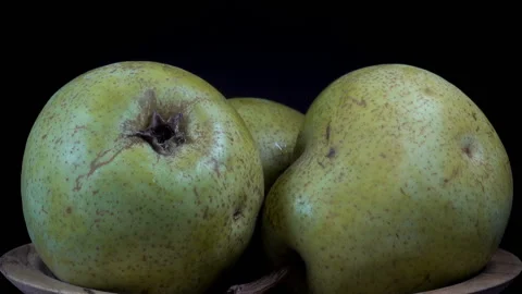 Green pears on a plate Stock Footage 152465582